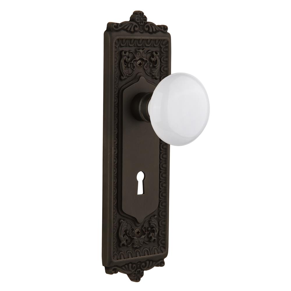 Nostalgic Warehouse 718337  Egg & Dart Plate with Keyhole Privacy White Porcelain Door Knob in Oil-Rubbed Bronze